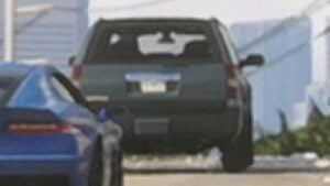 The rear side of a Declasse Granger driving on a highway in GTA VI