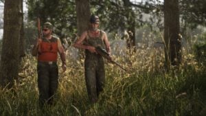 A pair of hunters patrol the woods with hunting rifles in GTA VI.