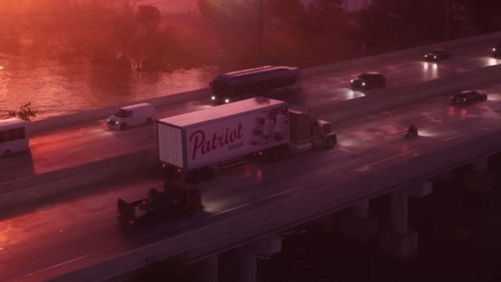 A Jobuilt Phantom on the highway in Leonida Keys in GTA VI. 