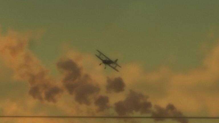 Western Company Duster seen flying over a field in an official GTA VI Ambrosia Screenshot
