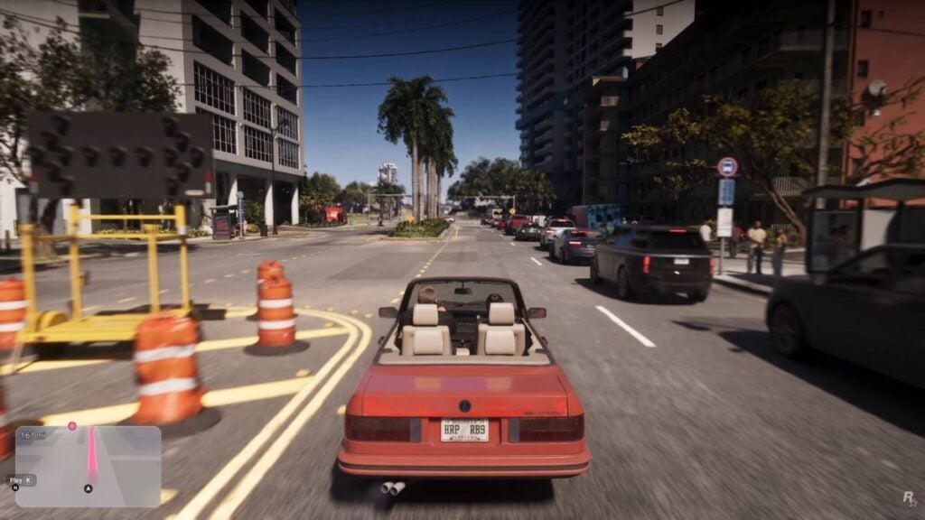 Jason and Lucia driving past a line of standing cars on the road during the Extended Look at GTA 6.