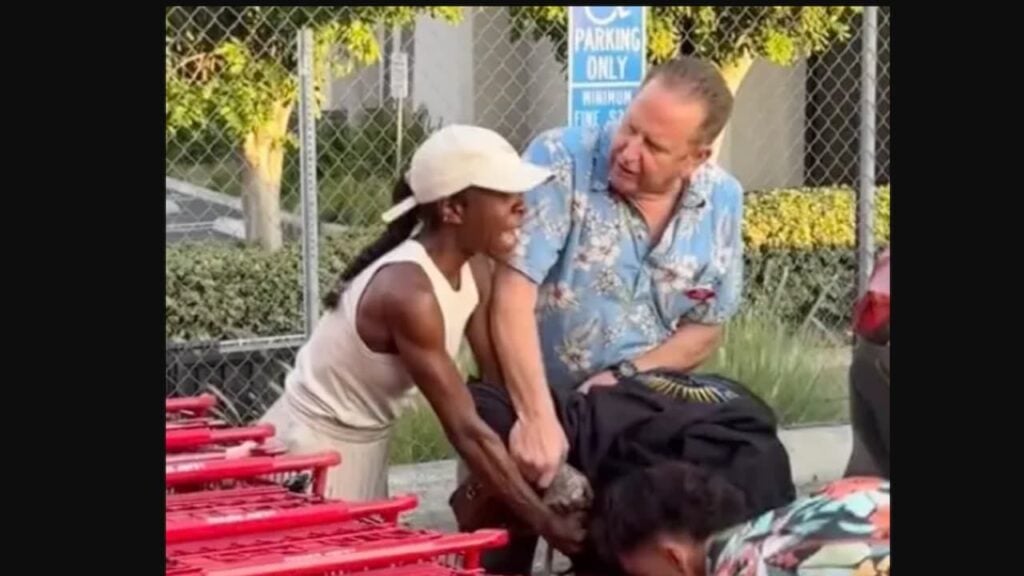 Bystanders trying to break up the fight